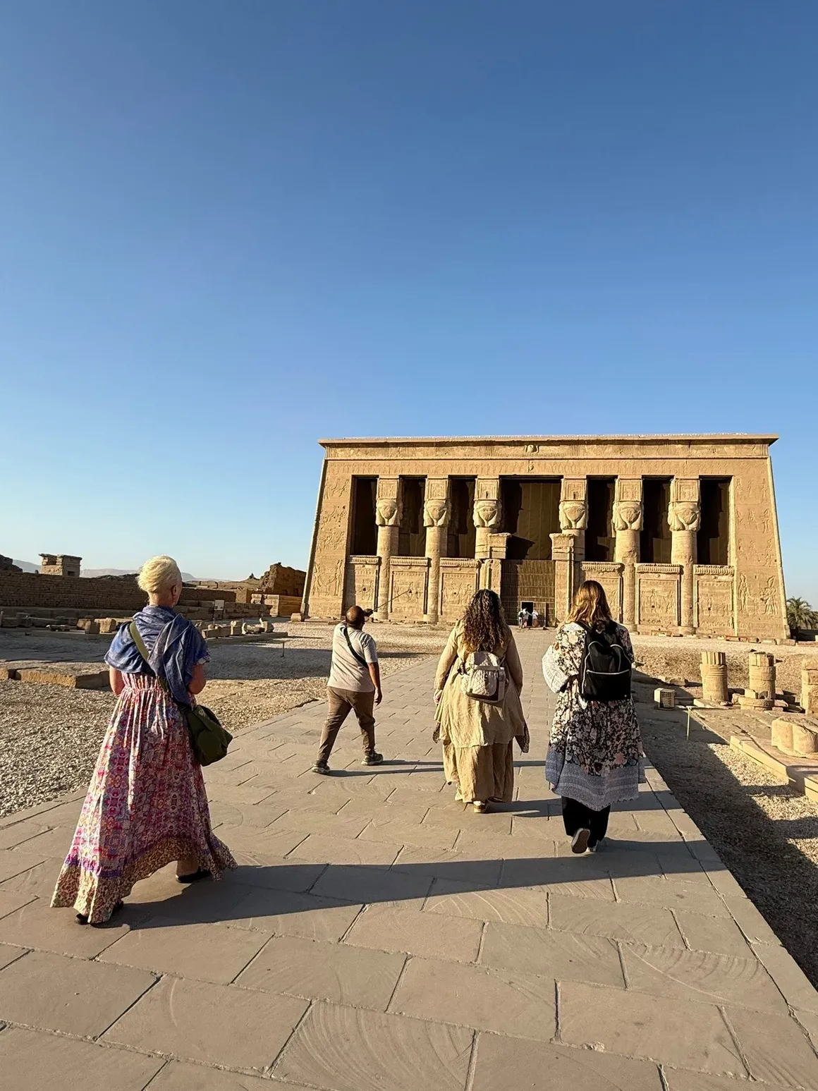 Travellers approaching an Egyptian temple